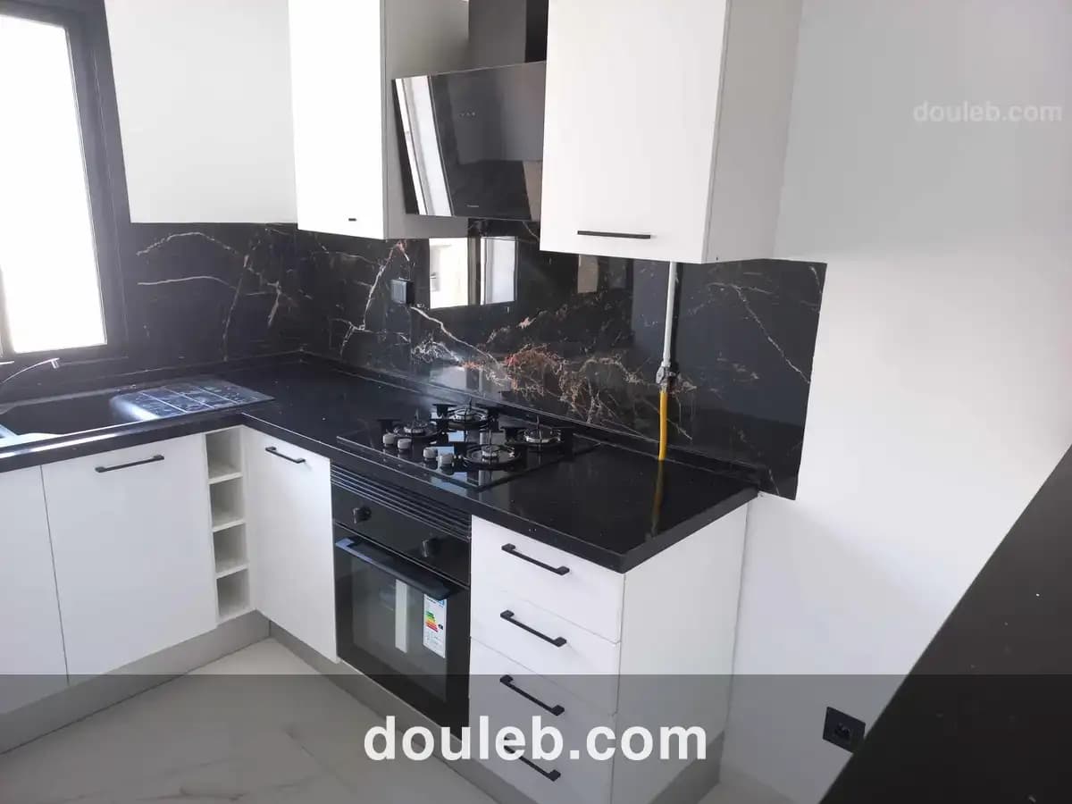 Appartement s2 derrière carrefour el wahat à Tunis