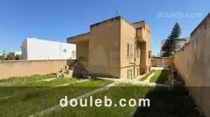 Villa de 438m2 terrain cite ennasr - Photo 1