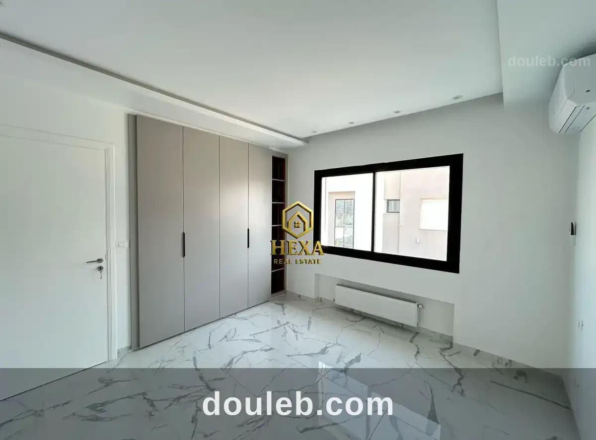 Duplex s3 avec piscine à la soukra - Miniature 3
