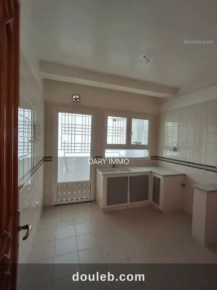 Appartement s2 à ennasr 2 - Miniature 2