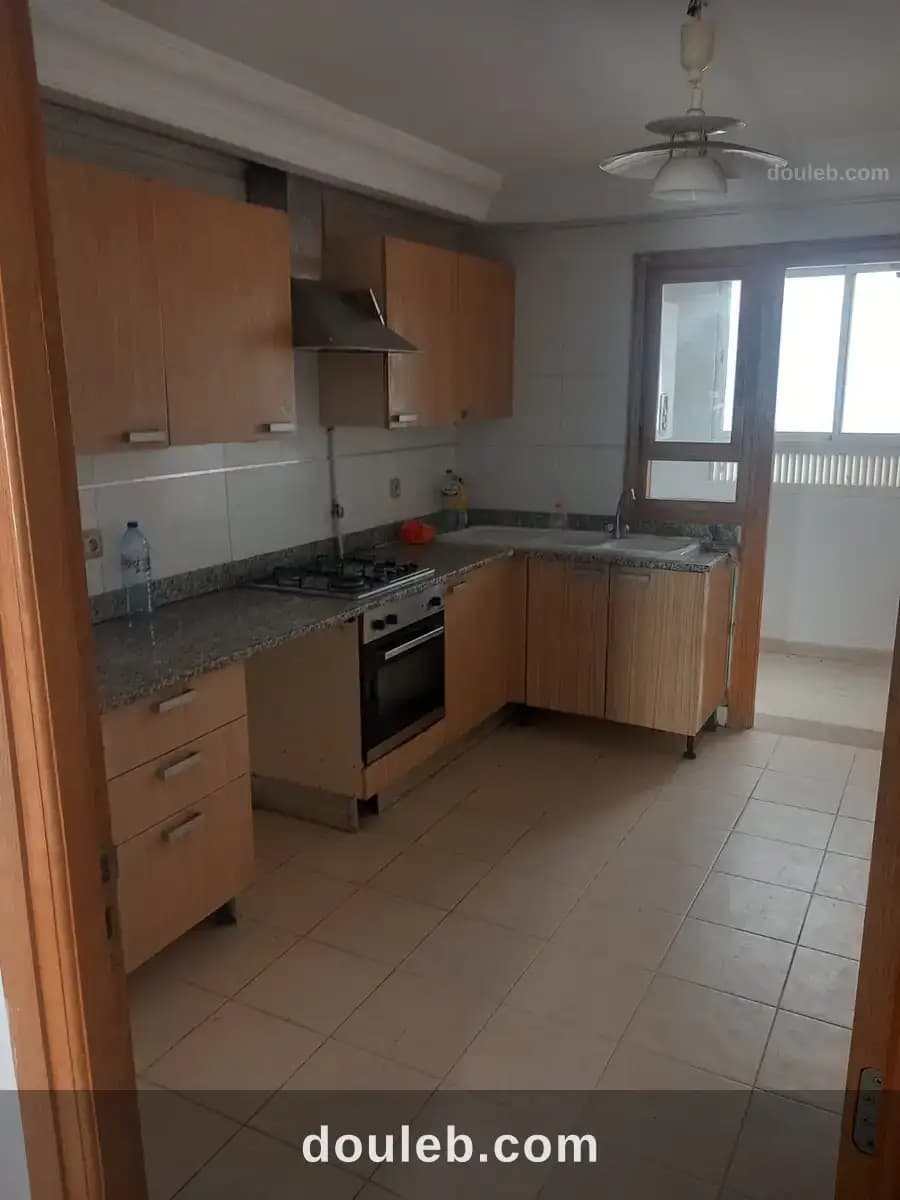 Un appartement s 2 cité nasr 2 - Miniature 3
