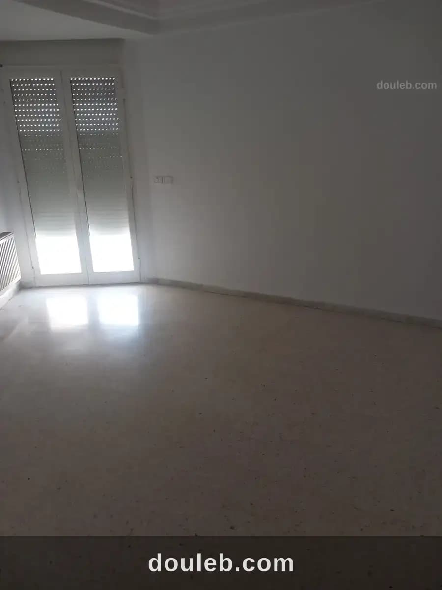 Un appartement s 2 cité nasr 2 - Miniature 4