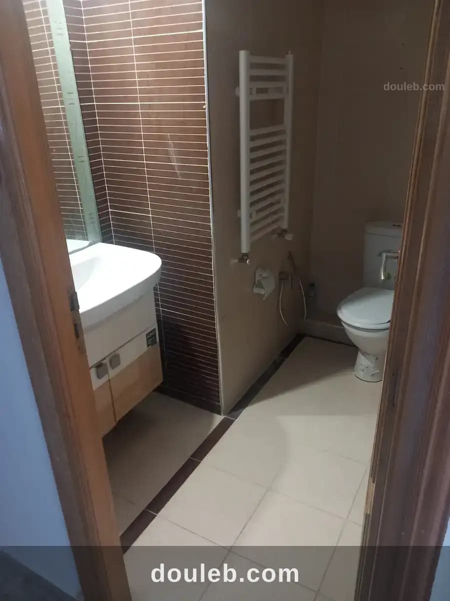 Un appartement s 2 cité nasr 2 - Miniature 5