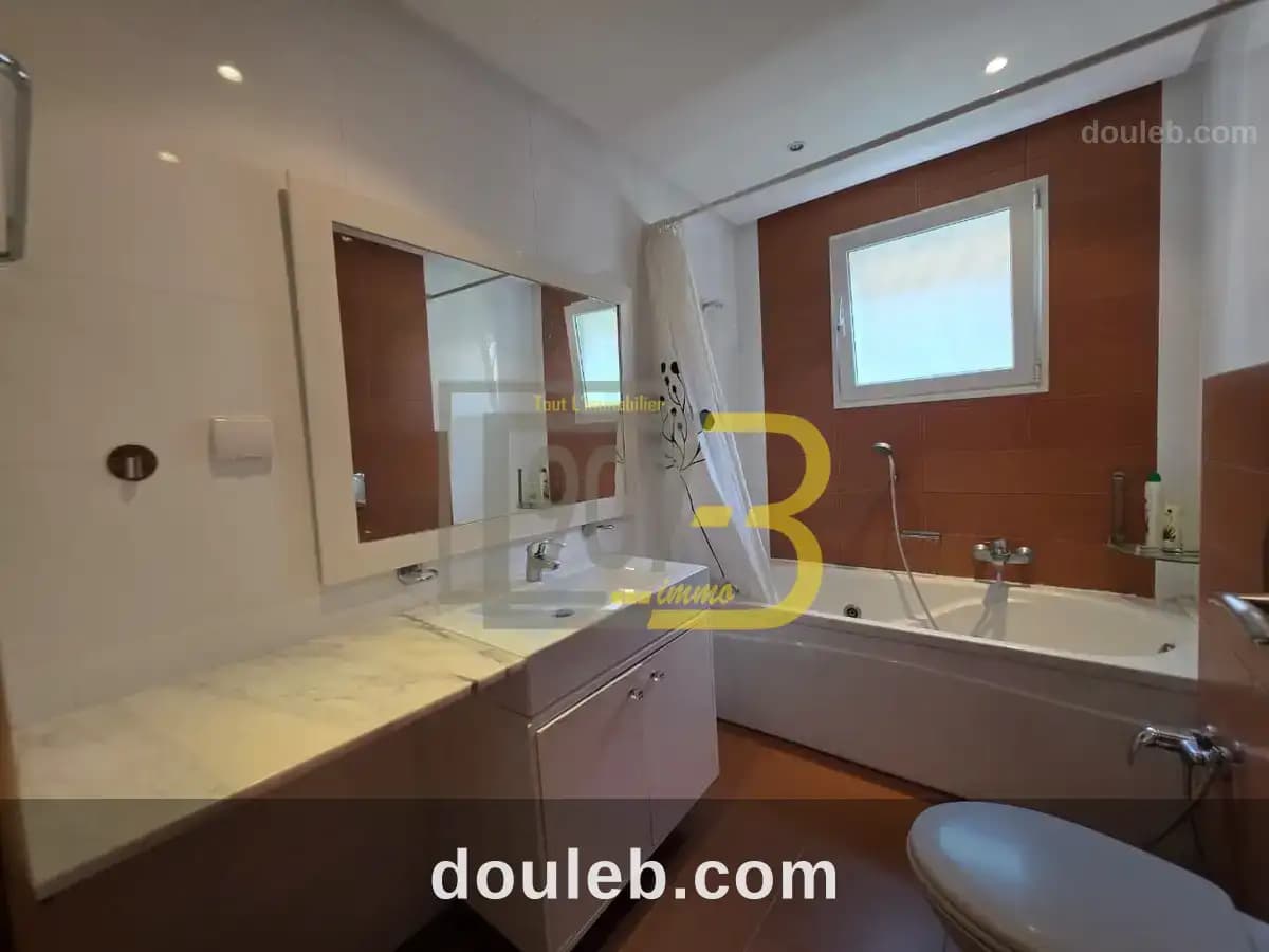 Appartement s2 avec jardin et terrasse à menzah 9b - Miniature 4