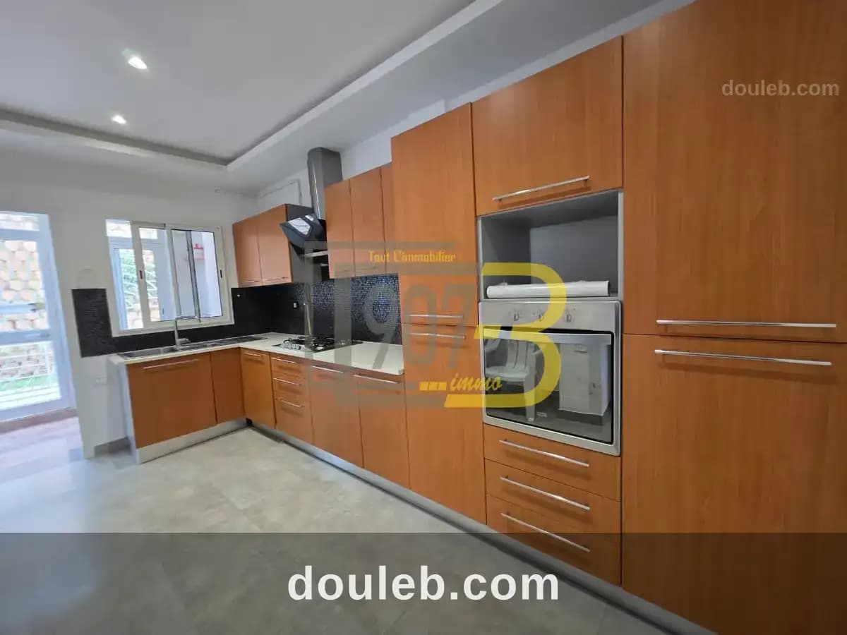 Appartement s2 avec jardin et terrasse à menzah 9b - Miniature 5
