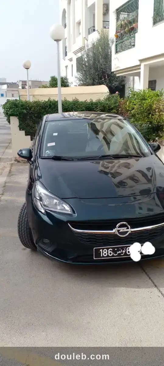 Opel corsa 5ch - Miniature 2