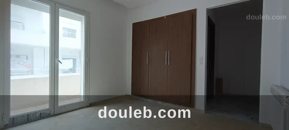 Appartement s3 au ennasr 2 - Miniature 3