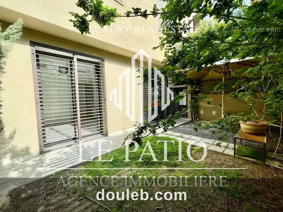 Appartement meuble s1 avec jardin - Photo 1