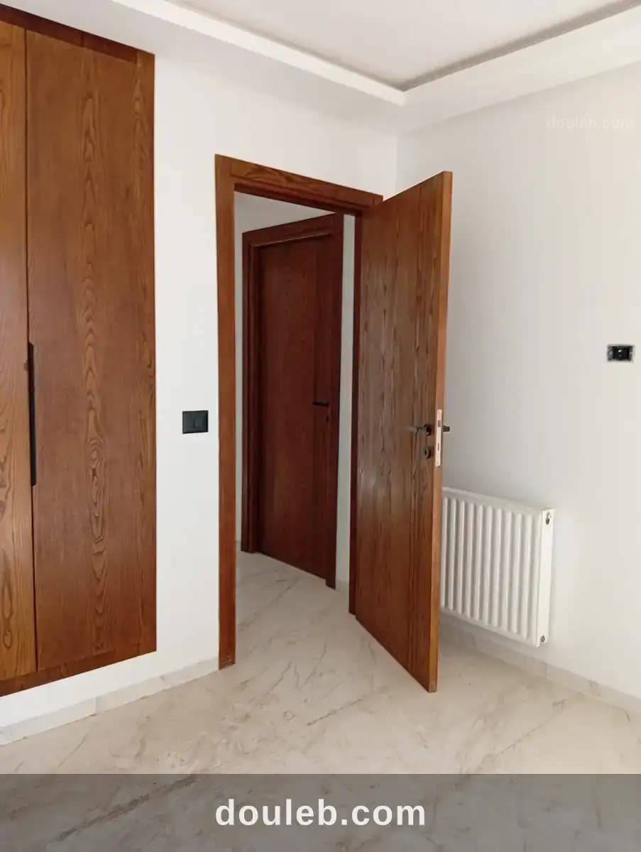 Un appartement s2 jamais habité à cité wahat - Photo 1