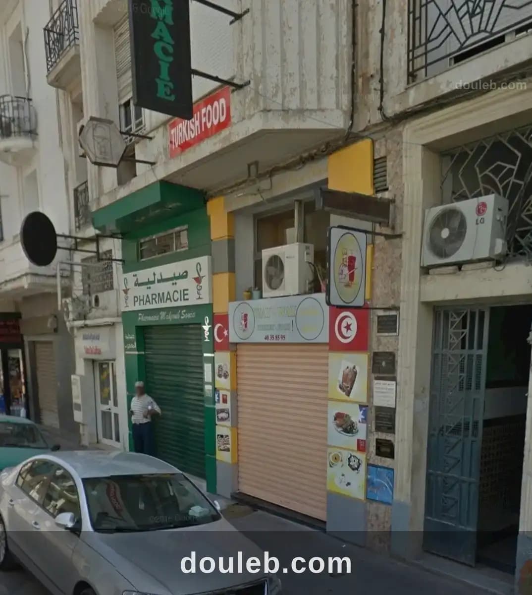 Magazin au centre - Photo 1