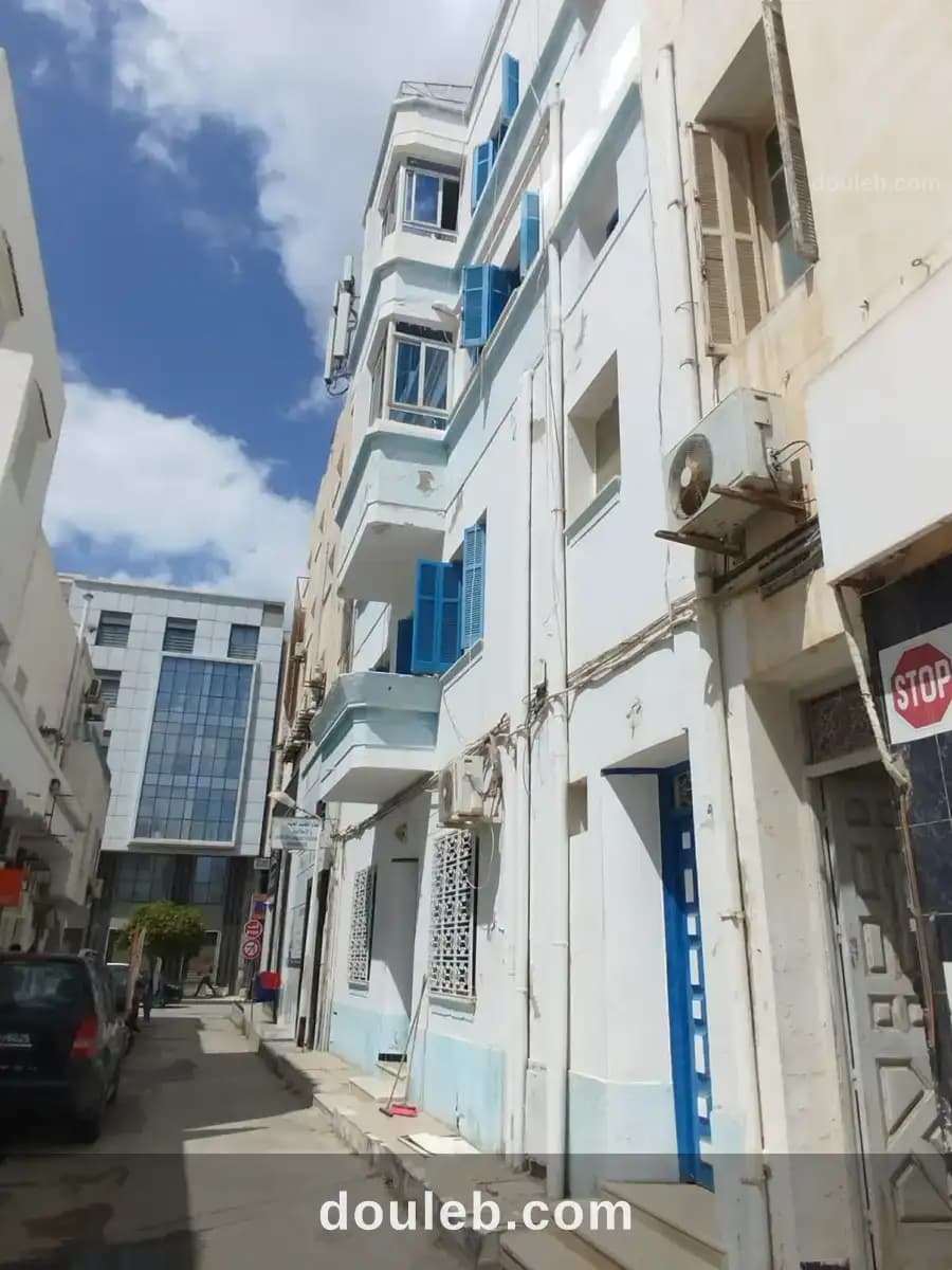 Immeuble quatre niveaux - Photo 1