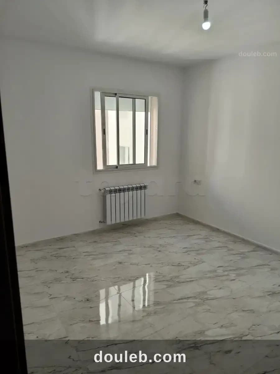 Un ravissant appartement s2 neuf à cité ettahrir - Miniature 2