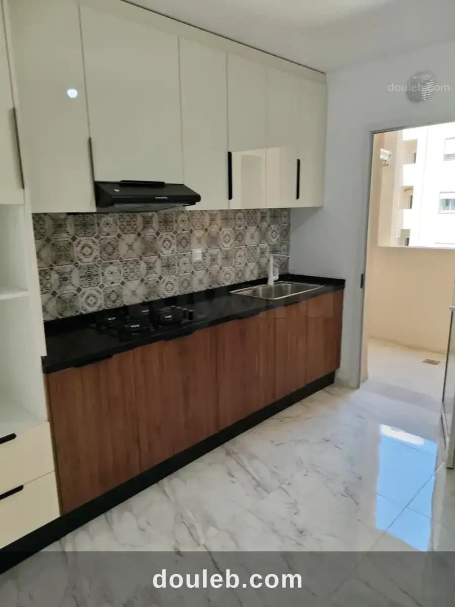 Un ravissant appartement s2 neuf à cité ettahrir - Miniature 3