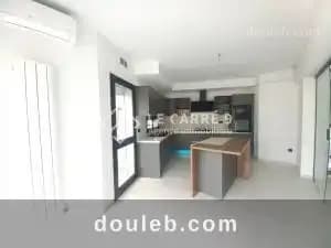 Un duplex neuf avec piscine - Miniature 5
