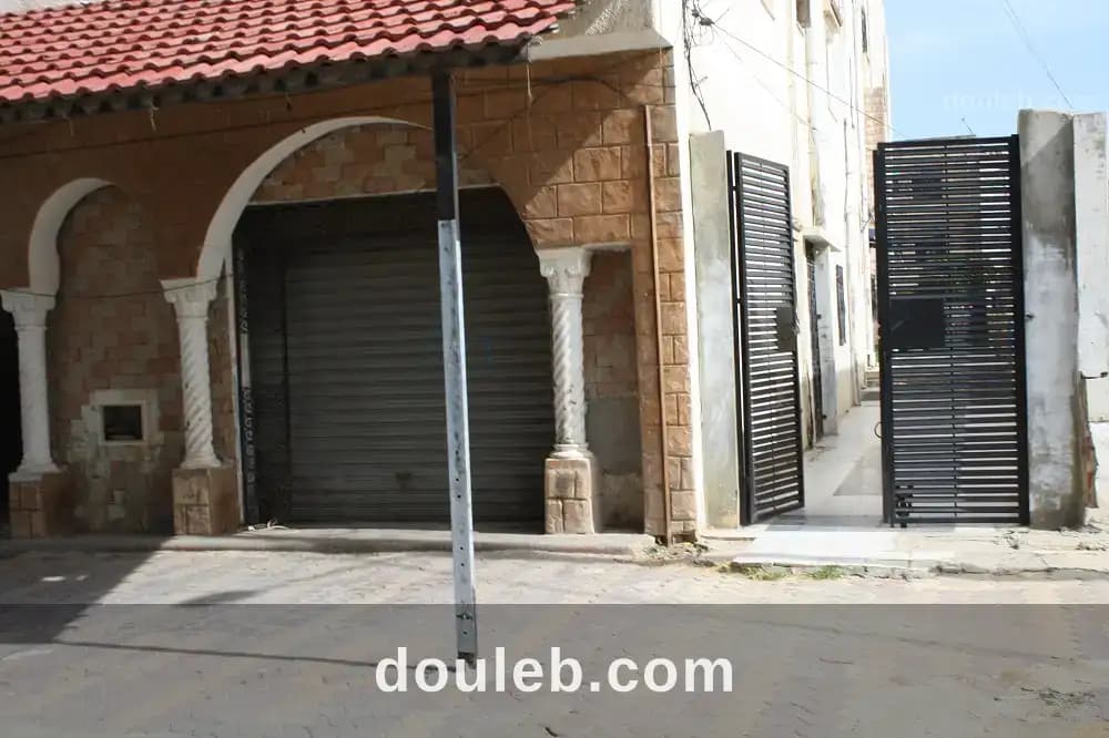 Gps appart rdc plus un local commercial - Photo 1