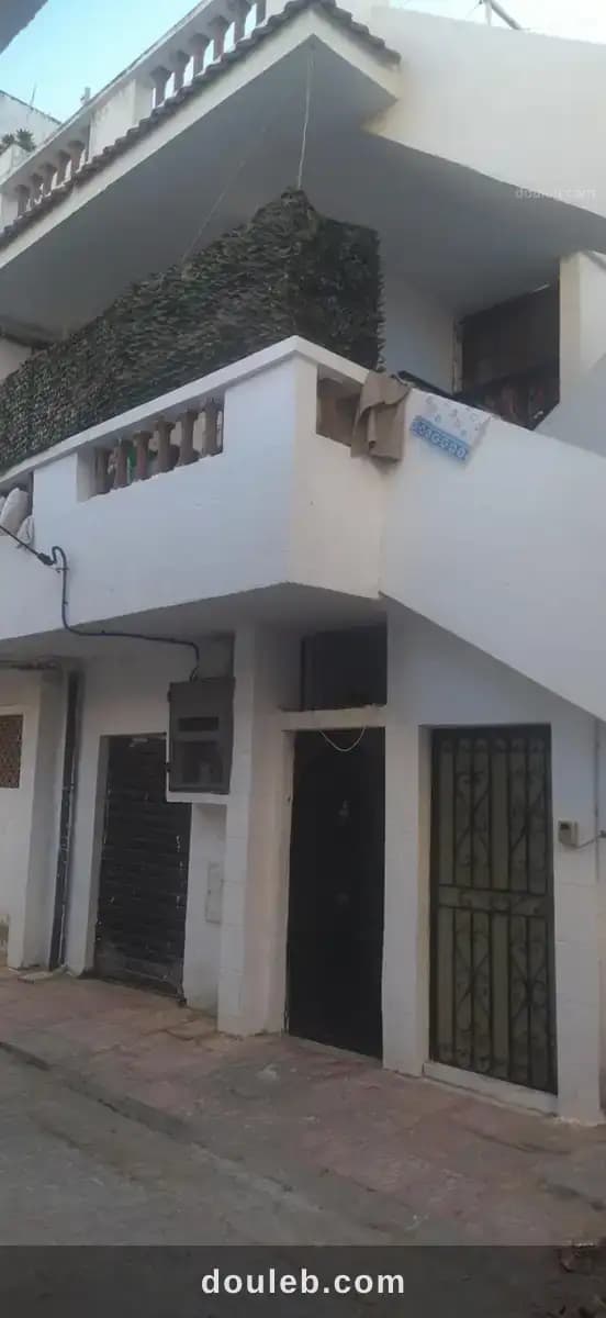 Une maison de trois étages - Photo 1