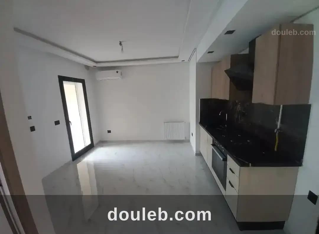 Un appartement vide nouvelle soukra jamais habitè - Miniature 3