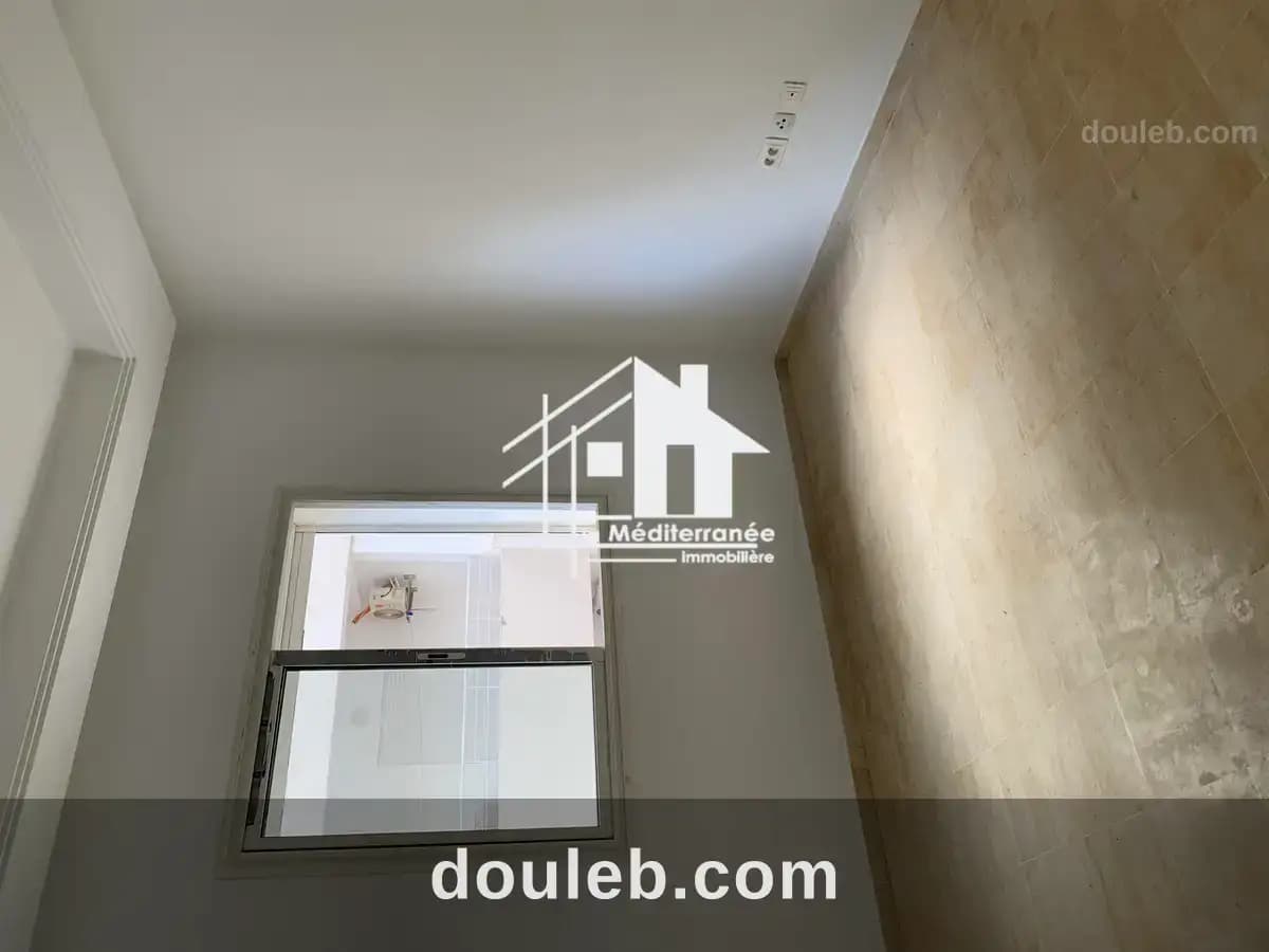 Un appartement s plus 1 à ennasr - Miniature 5