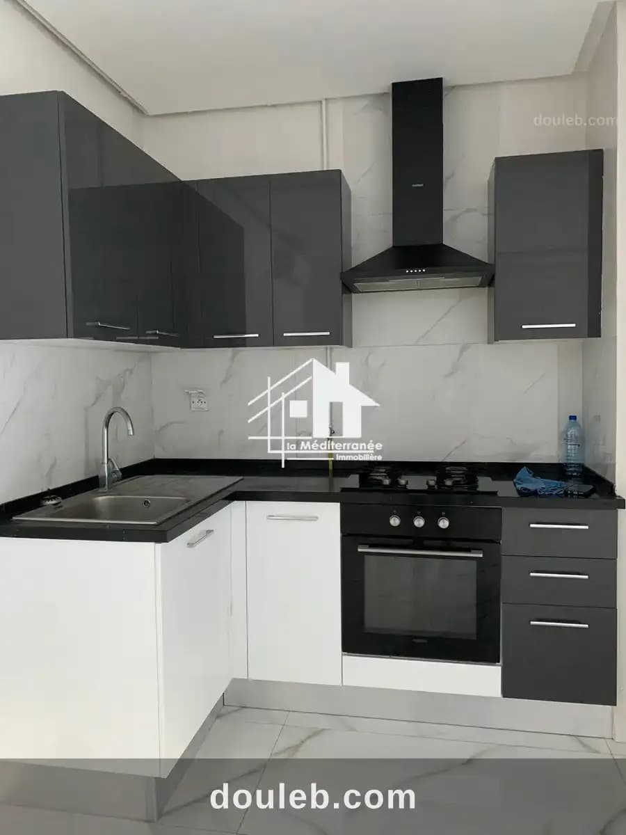 Un appartement s 1 haut standing à ennasr - Photo 1
