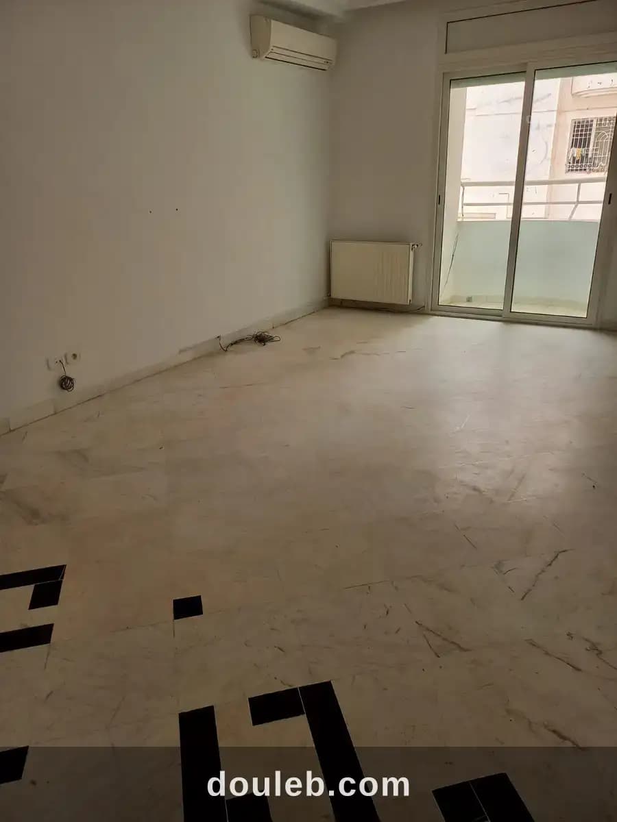 Un appartement s 2 cité nasr 2 - Miniature 2