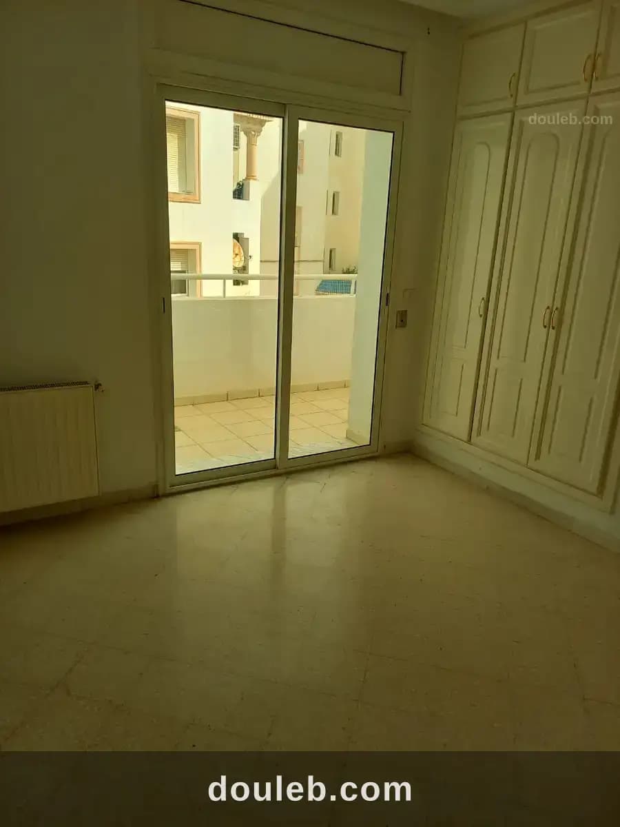 Un appartement s 2 cité nasr 2 - Miniature 4