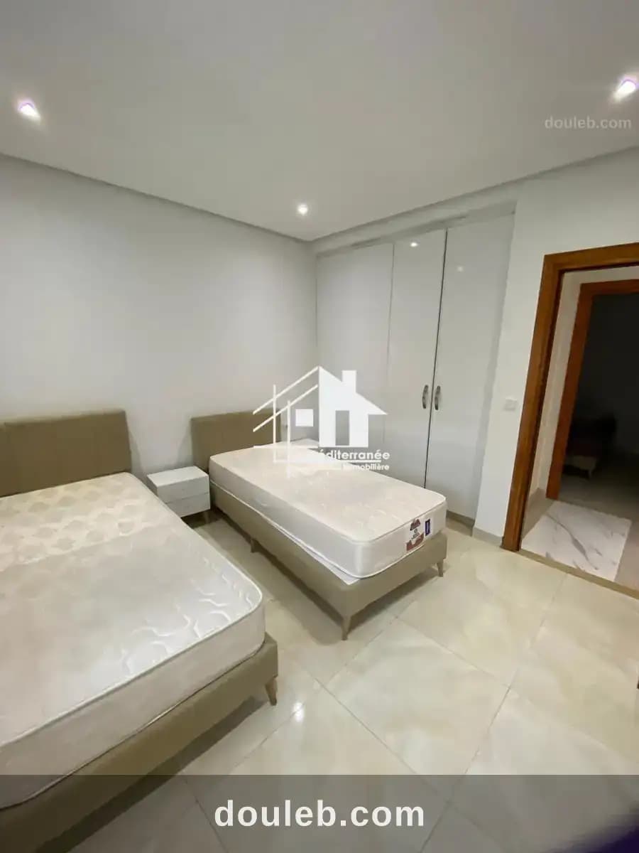 Un appartement s3 rdc meublé avec jardin au bardo - Miniature 3