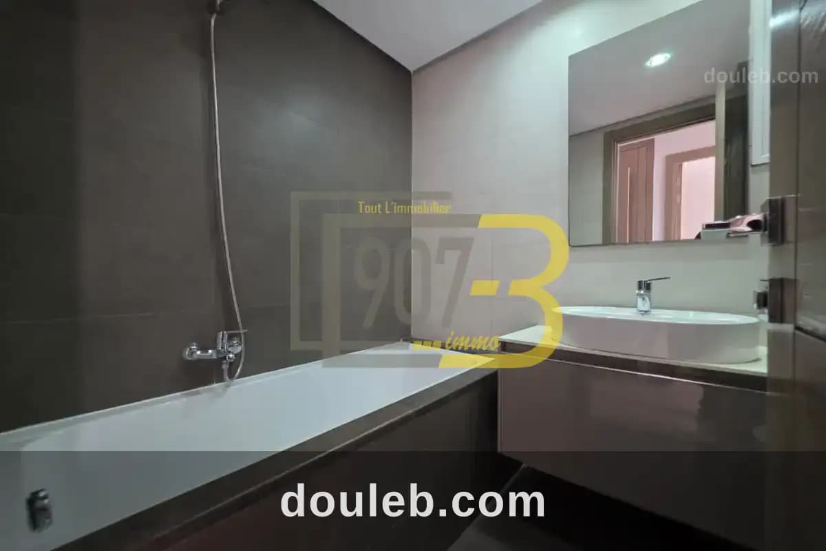 Un très bel appartement s2 à ennasr - Miniature 5