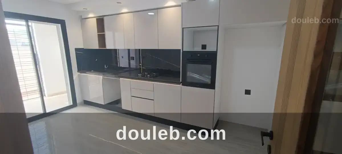 Appartement s2 avec jardin privé à ennasr - Miniature 3
