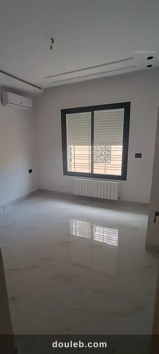 Appartement s2 avec jardin privé à ennasr - Miniature 4