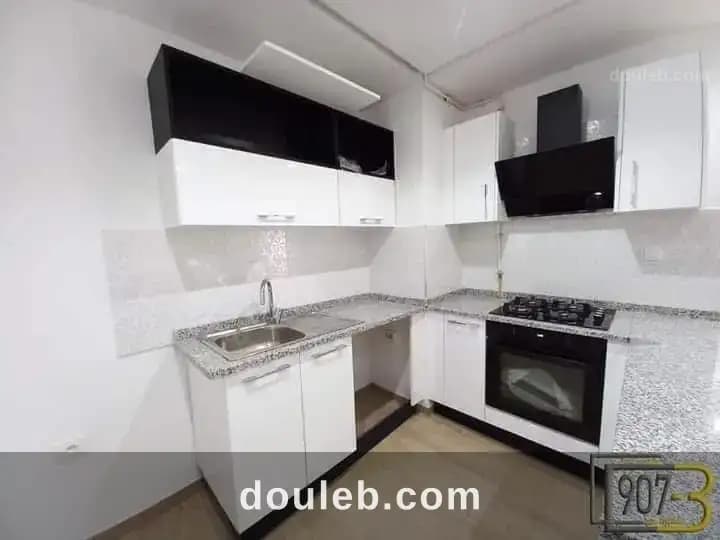 Un appartement s1 vide de 75m2 à ennasr - Miniature 2
