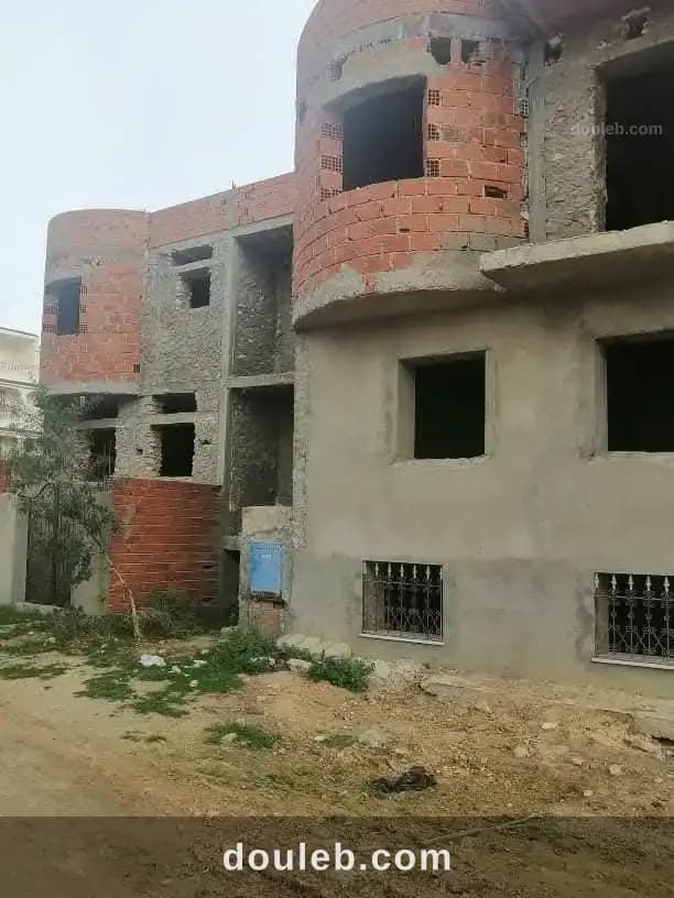 Avec titre bleu à Sousse