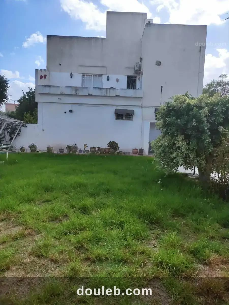 Maison sur 2 niveaux avec jardin - Miniature 2