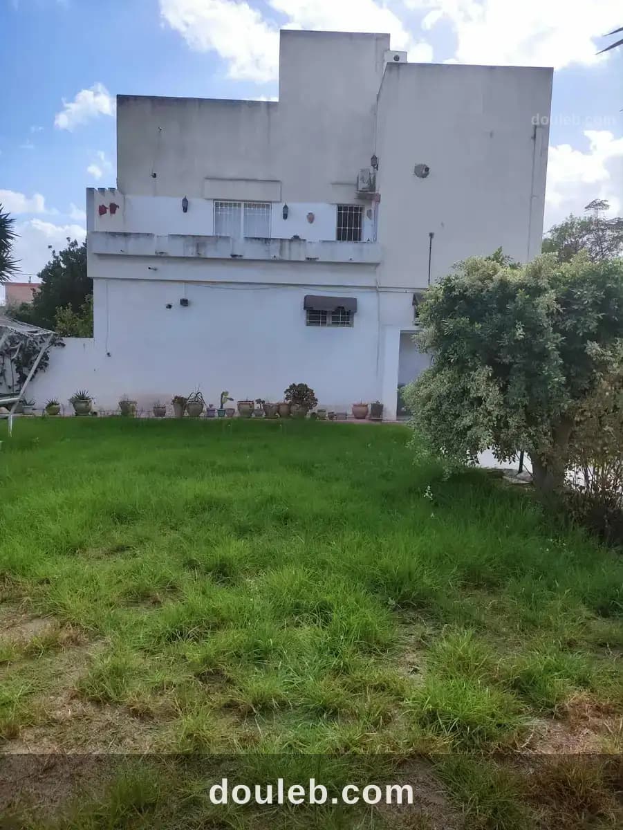Maison sur 2 niveaux avec jardin - Miniature 4