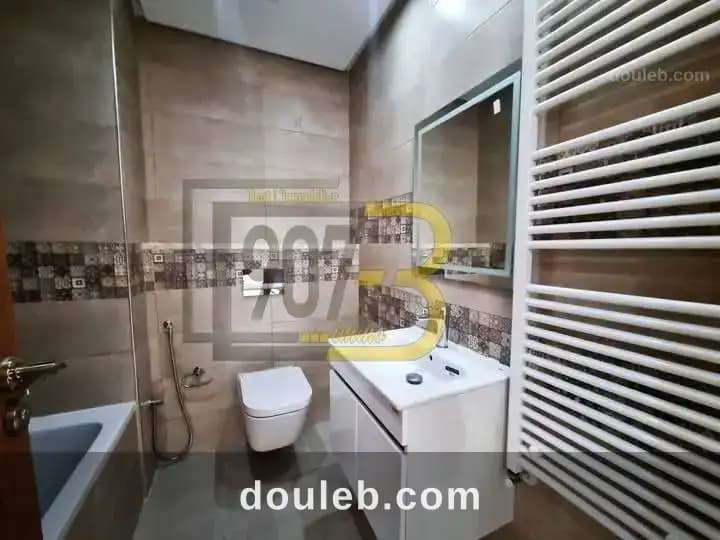 Un appartement style duplex à ennasr - Miniature 5