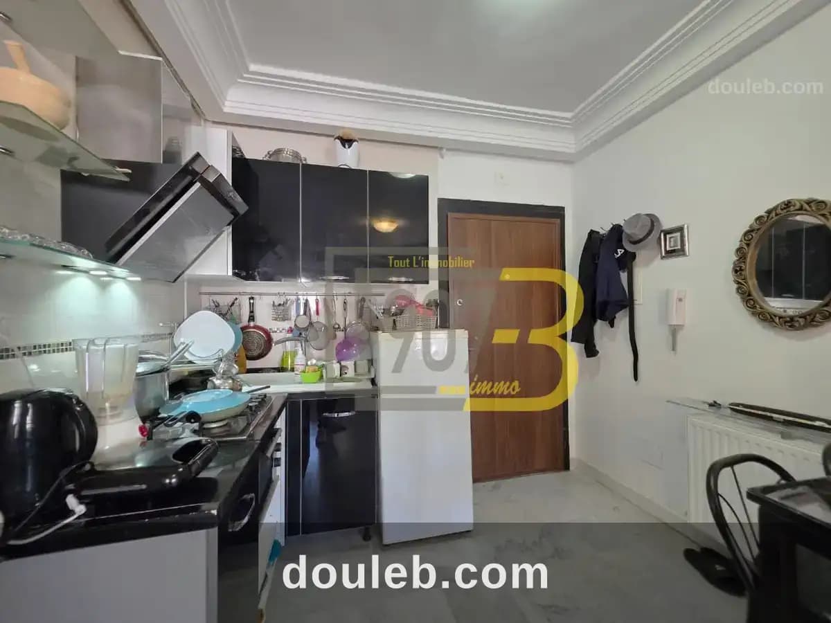 Un appartement s1 vide à cité ennasr - Miniature 5