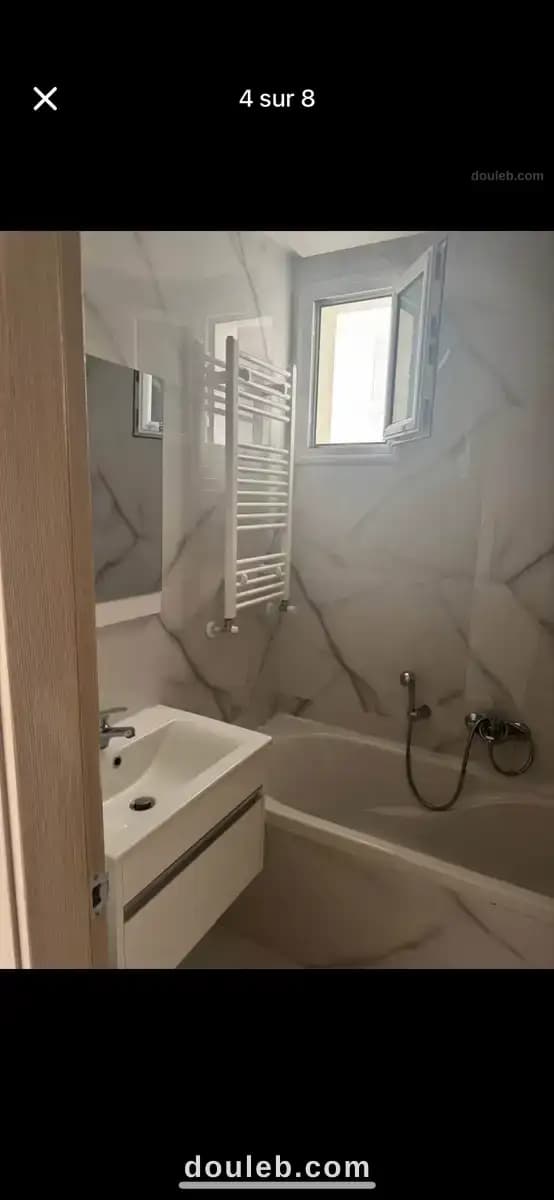 Un appartement s1à ennasr 2 - Miniature 4