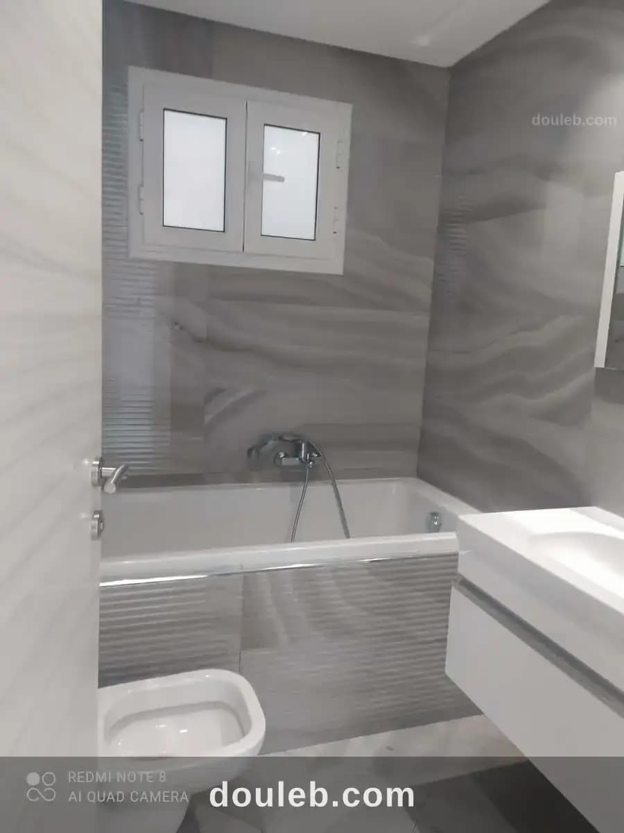 Ennasr 2 joli appt s2 haut stg bien situé - Miniature 4