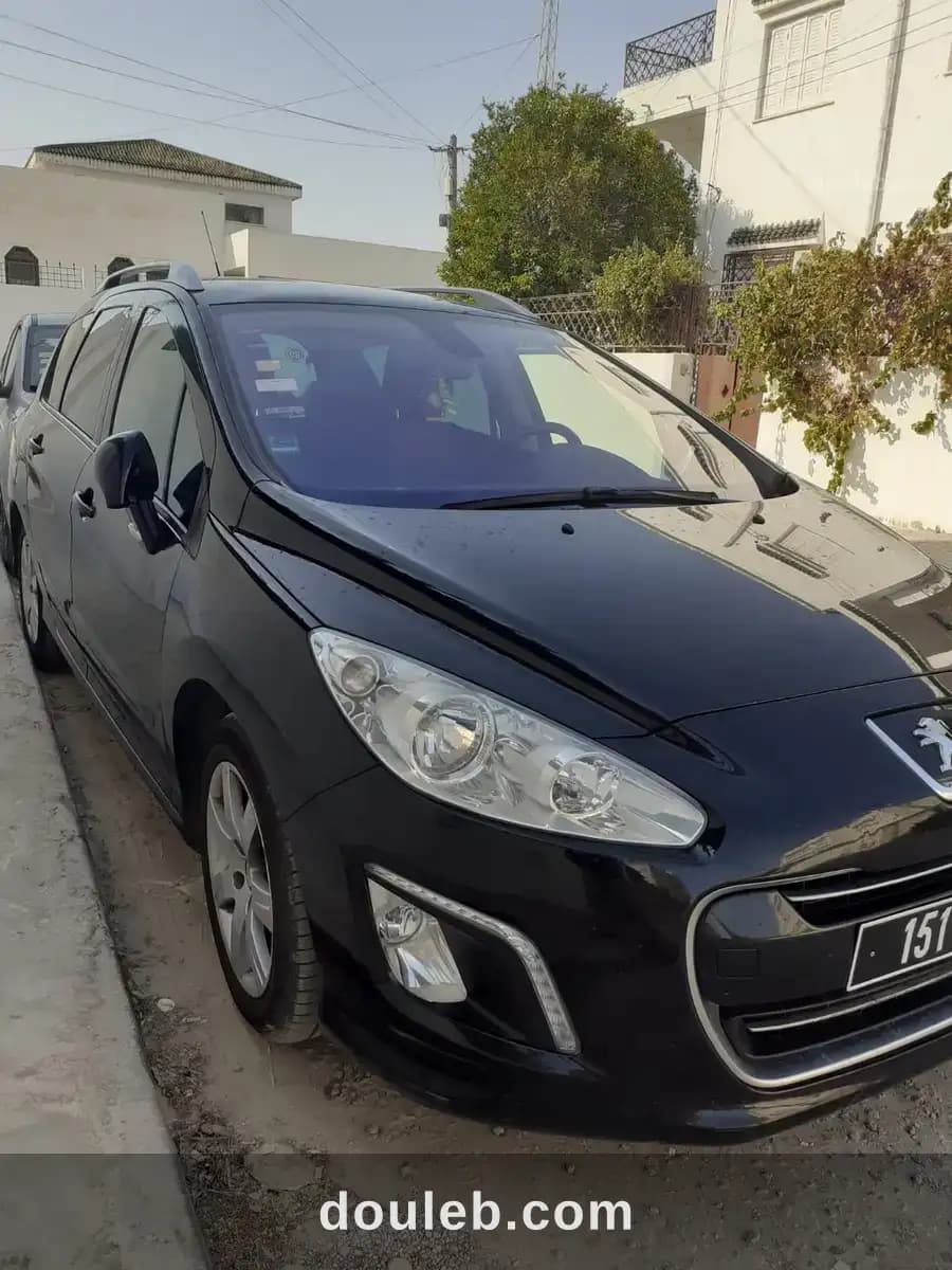 Peugeot 308 - Photo 1