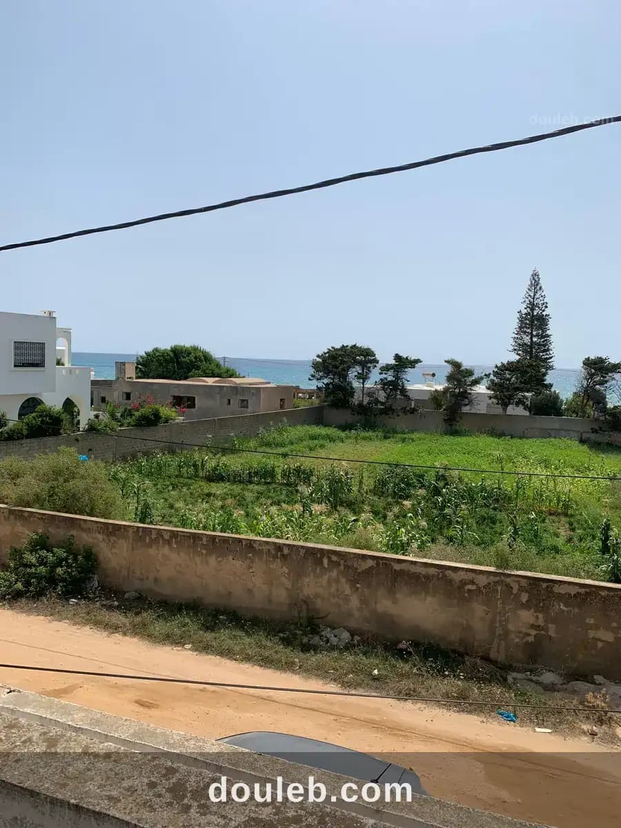 Terrain de 600m2 à la plage - Miniature 2