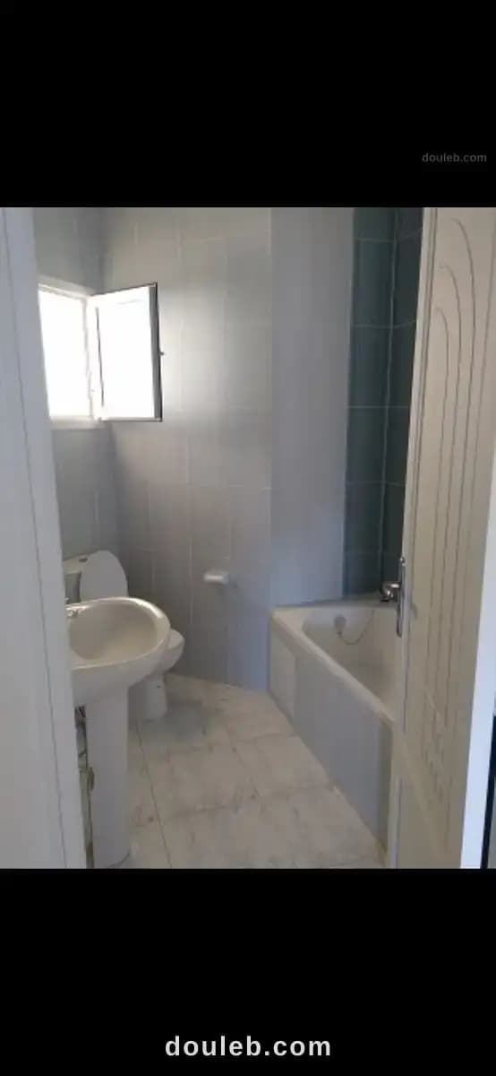 Appartement à cité ons2 - Miniature 3