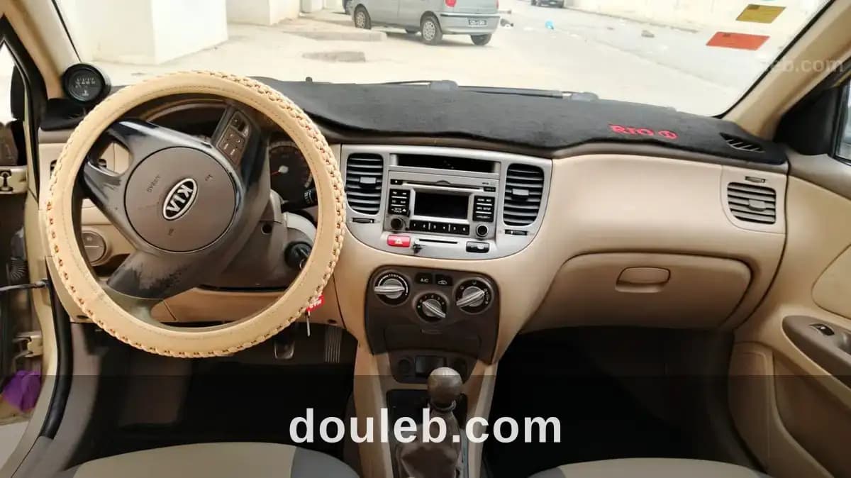 Kia rio anne 2010 essence premiere main - Miniature 3