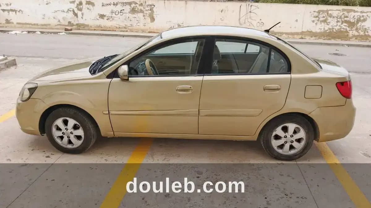 Kia rio anne 2010 essence premiere main - Miniature 5
