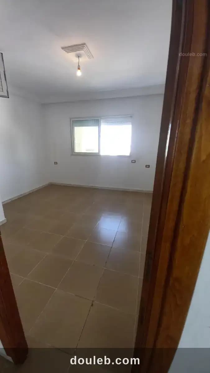 Appartement à rue el ghofrane - Miniature 4