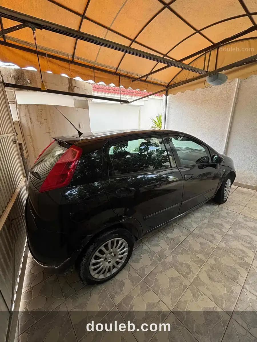 Voiture occasion fiat grande punto - Miniature 4