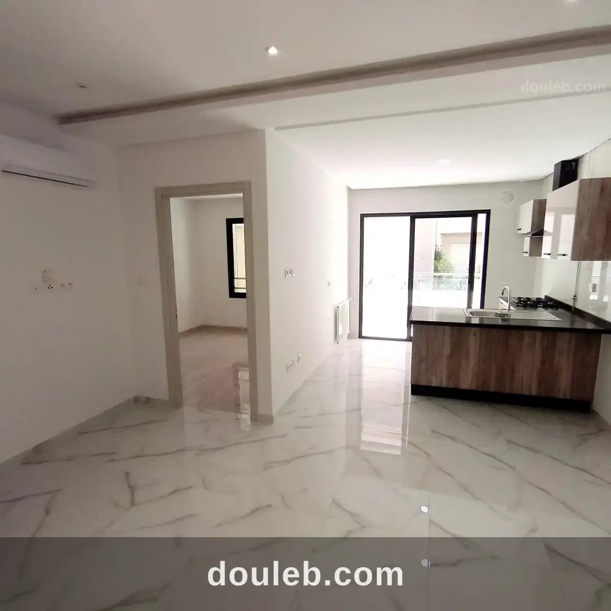 Un appartement s 1 cité nasr 2 à Ariana