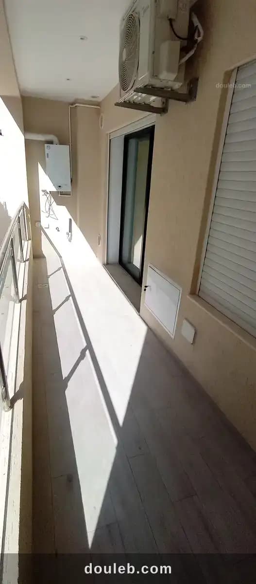 Un appartement s 1 cité nasr 2 - Miniature 5