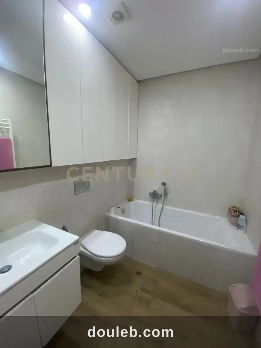 Un appartement s2 meublé a cité ennasr 2 - Miniature 4