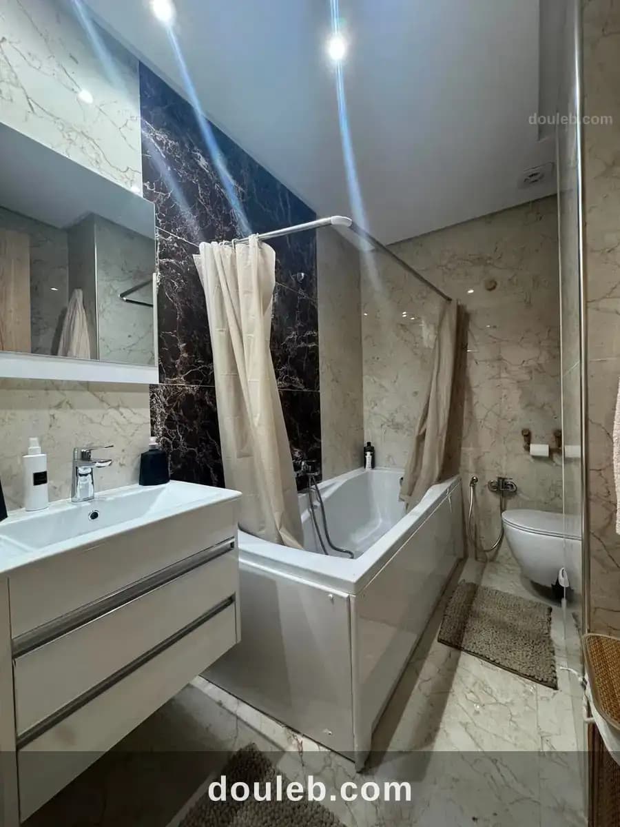Appartement s3 richement meublé à menzah 9c - Miniature 5