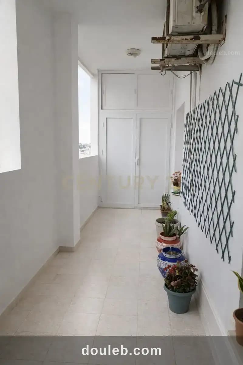 Un appartement s3 à ennasr 2 - Miniature 4