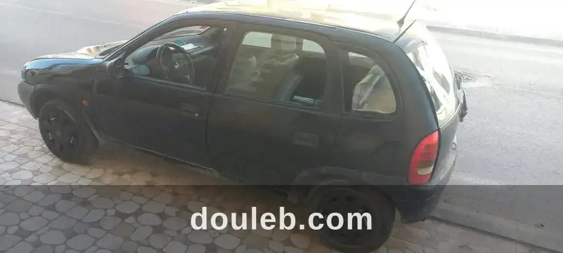 Opel corsa essence 1998 - Miniature 3